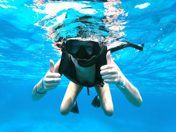 beach cleaning and snorkel activities in jamaica - snorkel girl